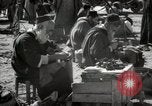 Image of People at work in marketplaces of Marrakech Morocco North Africa, 1942, second 47 stock footage video 65675067431