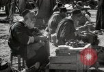 Image of People at work in marketplaces of Marrakech Morocco North Africa, 1942, second 48 stock footage video 65675067431
