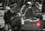 Image of People at work in marketplaces of Marrakech Morocco North Africa, 1942, second 50 stock footage video 65675067431