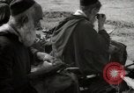 Image of People at work in marketplaces of Marrakech Morocco North Africa, 1942, second 54 stock footage video 65675067431