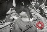 Image of People at work in marketplaces of Marrakech Morocco North Africa, 1942, second 56 stock footage video 65675067431
