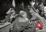 Image of People at work in marketplaces of Marrakech Morocco North Africa, 1942, second 62 stock footage video 65675067431