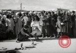 Image of Outdoor performers entertain spectators in Marrakech Morocco North Africa, 1942, second 3 stock footage video 65675067432