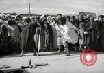 Image of Outdoor performers entertain spectators in Marrakech Morocco North Africa, 1942, second 4 stock footage video 65675067432