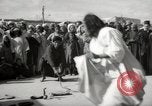 Image of Outdoor performers entertain spectators in Marrakech Morocco North Africa, 1942, second 7 stock footage video 65675067432