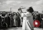 Image of Outdoor performers entertain spectators in Marrakech Morocco North Africa, 1942, second 9 stock footage video 65675067432