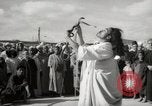 Image of Outdoor performers entertain spectators in Marrakech Morocco North Africa, 1942, second 11 stock footage video 65675067432