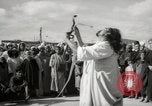 Image of Outdoor performers entertain spectators in Marrakech Morocco North Africa, 1942, second 12 stock footage video 65675067432