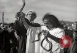 Image of Outdoor performers entertain spectators in Marrakech Morocco North Africa, 1942, second 14 stock footage video 65675067432