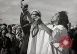 Image of Outdoor performers entertain spectators in Marrakech Morocco North Africa, 1942, second 16 stock footage video 65675067432