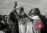 Image of Outdoor performers entertain spectators in Marrakech Morocco North Africa, 1942, second 17 stock footage video 65675067432