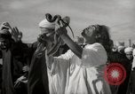 Image of Outdoor performers entertain spectators in Marrakech Morocco North Africa, 1942, second 18 stock footage video 65675067432