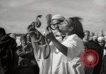 Image of Outdoor performers entertain spectators in Marrakech Morocco North Africa, 1942, second 21 stock footage video 65675067432