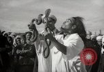 Image of Outdoor performers entertain spectators in Marrakech Morocco North Africa, 1942, second 23 stock footage video 65675067432