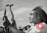 Image of Outdoor performers entertain spectators in Marrakech Morocco North Africa, 1942, second 26 stock footage video 65675067432