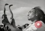 Image of Outdoor performers entertain spectators in Marrakech Morocco North Africa, 1942, second 27 stock footage video 65675067432