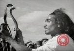 Image of Outdoor performers entertain spectators in Marrakech Morocco North Africa, 1942, second 28 stock footage video 65675067432
