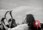 Image of Outdoor performers entertain spectators in Marrakech Morocco North Africa, 1942, second 31 stock footage video 65675067432