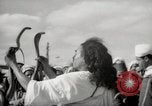 Image of Outdoor performers entertain spectators in Marrakech Morocco North Africa, 1942, second 33 stock footage video 65675067432