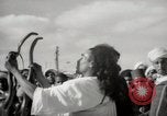 Image of Outdoor performers entertain spectators in Marrakech Morocco North Africa, 1942, second 34 stock footage video 65675067432