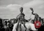Image of Outdoor performers entertain spectators in Marrakech Morocco North Africa, 1942, second 37 stock footage video 65675067432