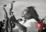 Image of Outdoor performers entertain spectators in Marrakech Morocco North Africa, 1942, second 44 stock footage video 65675067432