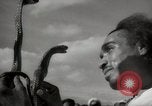 Image of Outdoor performers entertain spectators in Marrakech Morocco North Africa, 1942, second 49 stock footage video 65675067432