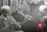 Image of Outdoor performers entertain spectators in Marrakech Morocco North Africa, 1942, second 50 stock footage video 65675067432