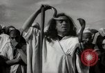 Image of Outdoor performers entertain spectators in Marrakech Morocco North Africa, 1942, second 55 stock footage video 65675067432