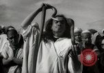 Image of Outdoor performers entertain spectators in Marrakech Morocco North Africa, 1942, second 57 stock footage video 65675067432