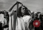 Image of Outdoor performers entertain spectators in Marrakech Morocco North Africa, 1942, second 59 stock footage video 65675067432