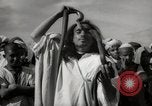Image of Outdoor performers entertain spectators in Marrakech Morocco North Africa, 1942, second 60 stock footage video 65675067432