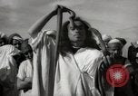 Image of Outdoor performers entertain spectators in Marrakech Morocco North Africa, 1942, second 61 stock footage video 65675067432