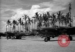 Image of Several Allied aircraft on Torokina Air Strip Bougainville Island Papua New Guinea, 1944, second 49 stock footage video 65675067448