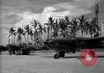 Image of Several Allied aircraft on Torokina Air Strip Bougainville Island Papua New Guinea, 1944, second 50 stock footage video 65675067448