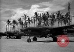 Image of Several Allied aircraft on Torokina Air Strip Bougainville Island Papua New Guinea, 1944, second 52 stock footage video 65675067448