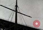 Image of activities at harbor United States USA, 1950, second 51 stock footage video 65675067495