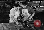 Image of automobile workers Detroit Michigan USA, 1950, second 53 stock footage video 65675067508