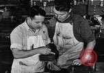 Image of automobile workers Detroit Michigan USA, 1950, second 54 stock footage video 65675067508