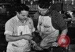 Image of automobile workers Detroit Michigan USA, 1950, second 55 stock footage video 65675067508