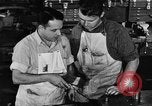 Image of automobile workers Detroit Michigan USA, 1950, second 57 stock footage video 65675067508