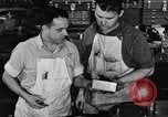 Image of automobile workers Detroit Michigan USA, 1950, second 59 stock footage video 65675067508