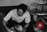Standbild Familie der amerikanischen Automobil Arbeiter Detroit Michigan USA, 1950, aus Sekunde 20 historischem Filmmaterial Videoclip 65675067510