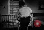 Standbild Familie der amerikanischen Automobil Arbeiter Detroit Michigan USA, 1950, aus Sekunde 57 historischem Filmmaterial Videoclip 65675067510
