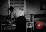 Standbild Familie der amerikanischen Automobil Arbeiter Detroit Michigan USA, 1950, aus Sekunde 58 historischem Filmmaterial Videoclip 65675067510
