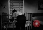 Standbild Familie der amerikanischen Automobil Arbeiter Detroit Michigan USA, 1950, aus Sekunde 60 historischem Filmmaterial Videoclip 65675067510