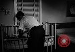 Standbild Familie der amerikanischen Automobil Arbeiter Detroit Michigan USA, 1950, aus Sekunde 61 historischem Filmmaterial Videoclip 65675067510