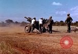 Image of 1st Cavalry Division artillerymen firing 105mm Howitzer Plei Me Vietnam, 1965, second 7 stock footage video 65675067579