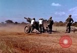 Image of 1st Cavalry Division artillerymen firing 105mm Howitzer Plei Me Vietnam, 1965, second 8 stock footage video 65675067579