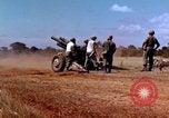 Image of 1st Cavalry Division artillerymen firing 105mm Howitzer Plei Me Vietnam, 1965, second 9 stock footage video 65675067579